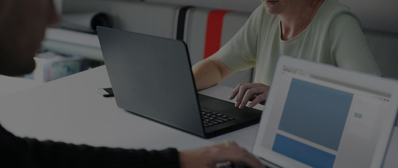 office-workers-looking-at-a-PDF-file